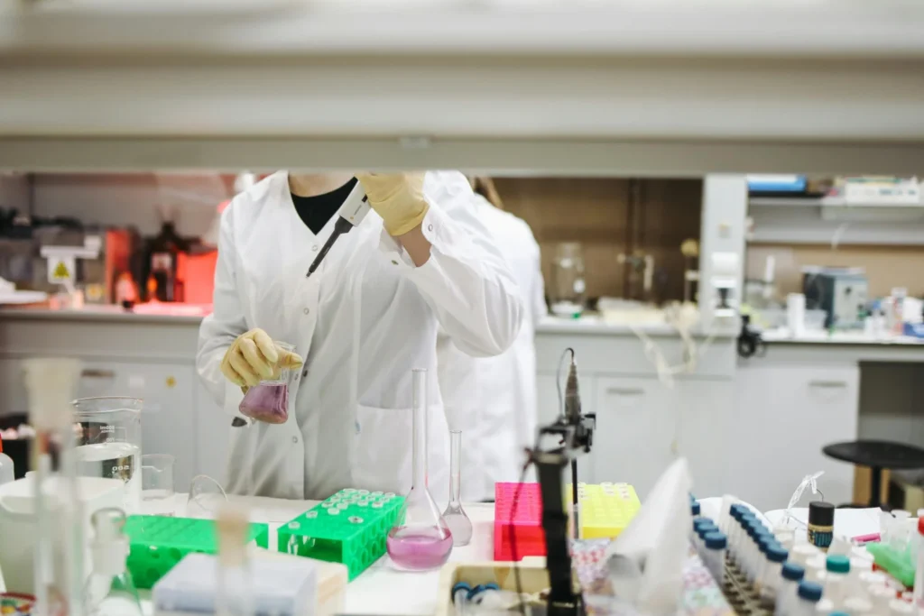Image of person researching at a lab for an article on Section 174A ruling under OBBA