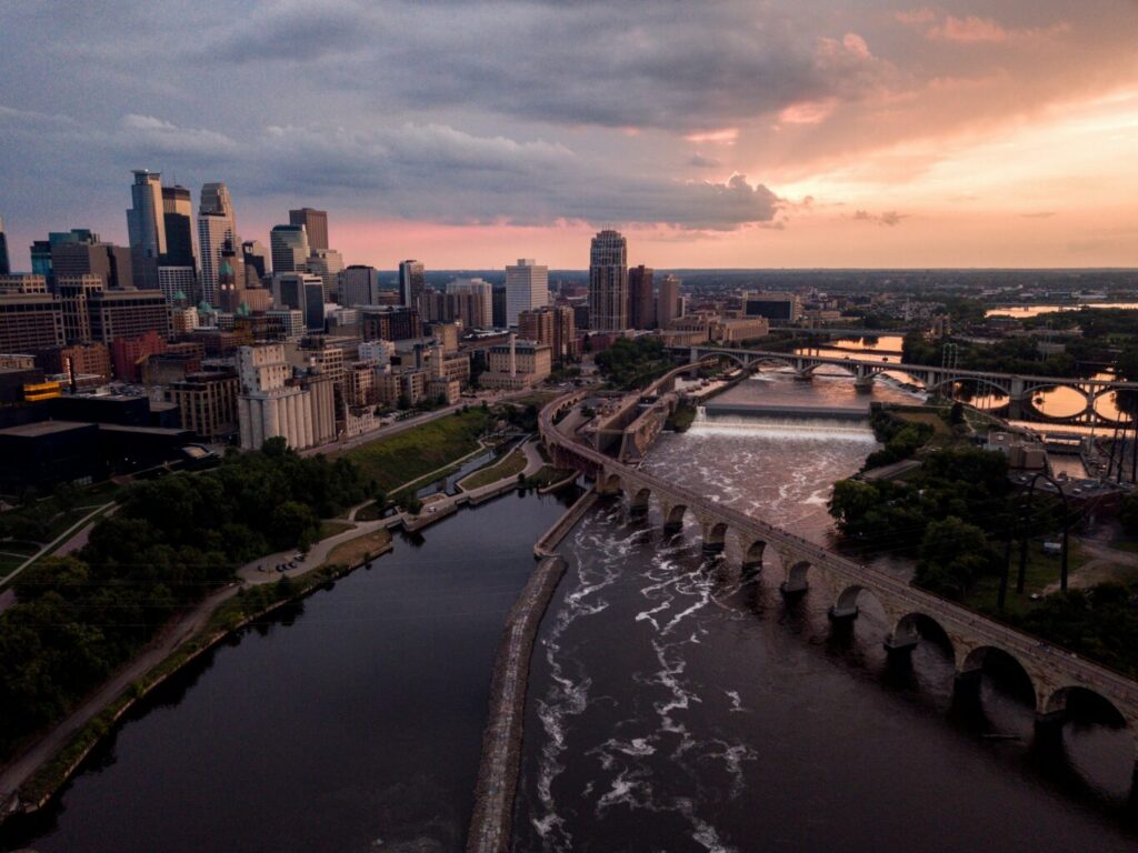 Aerial shot of concrete structures near body of water