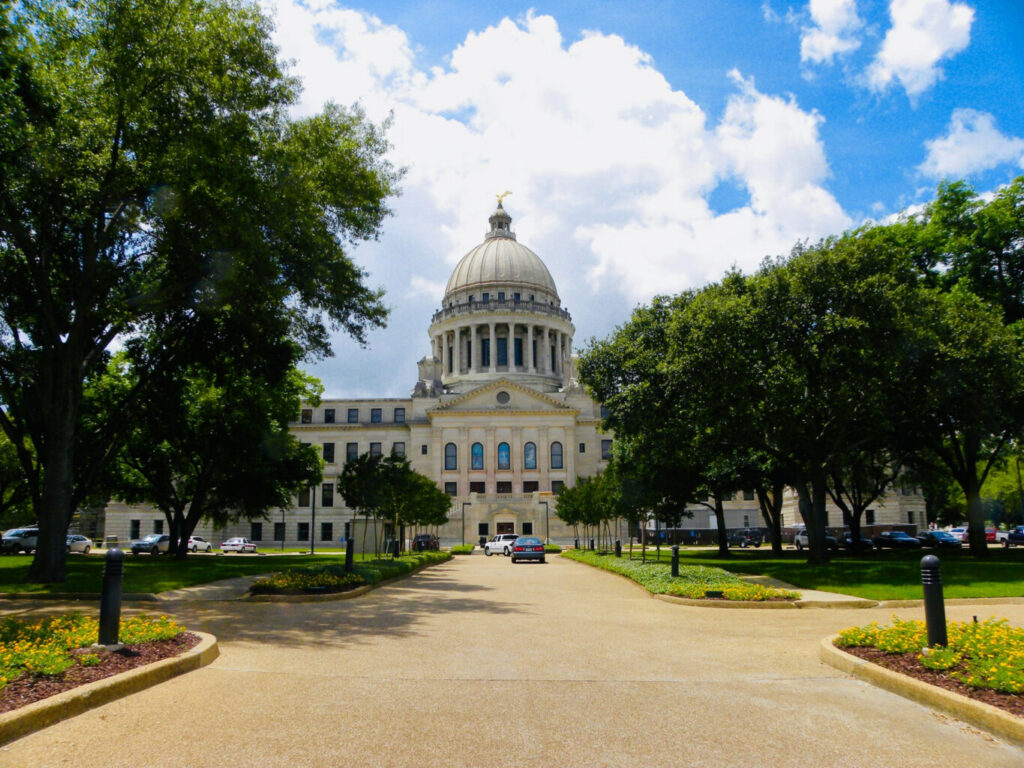 Wide shot of the Mississippi State Capitol in Jackson, the administrative hub for state matters such as Mississippi corporate state taxes.