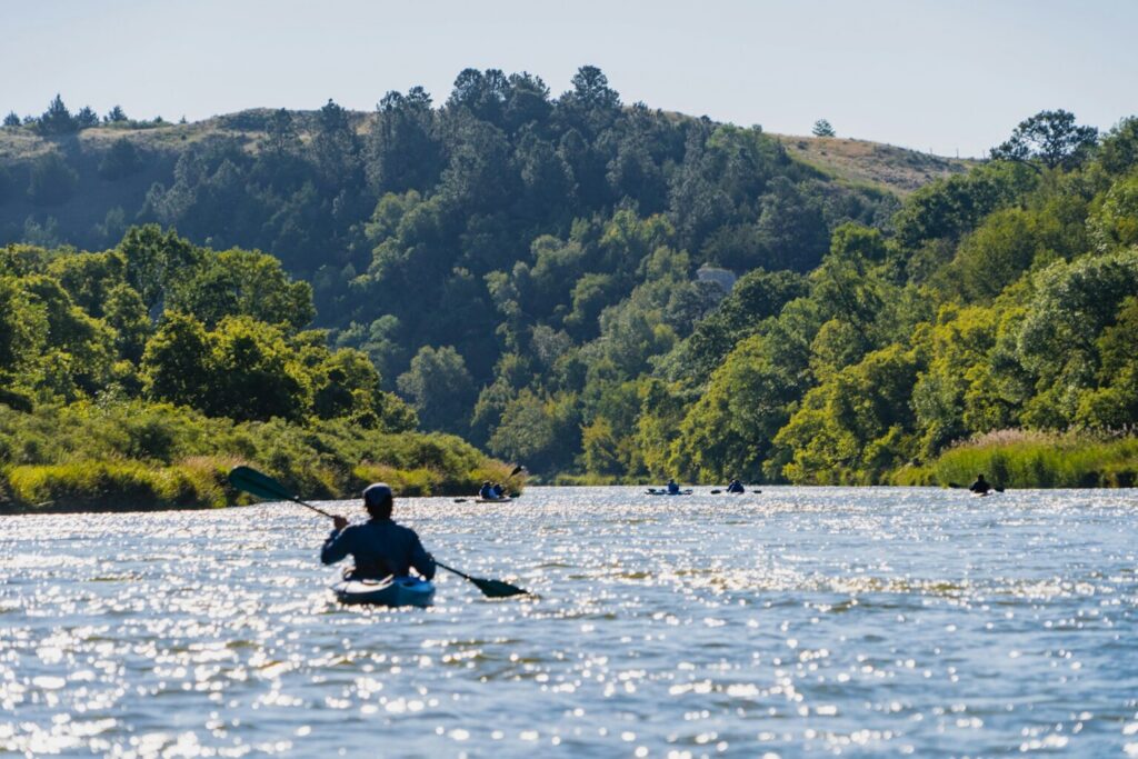 A man kayaking on the Niobrara River in Nebraska.
