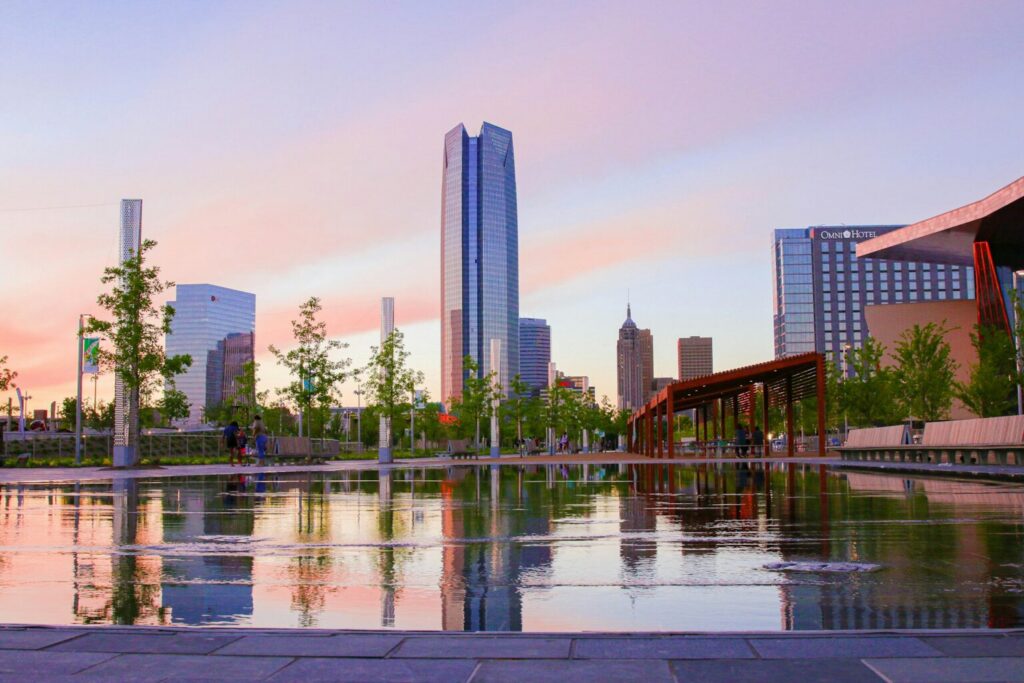 Body of water near high rise buildings during day time.